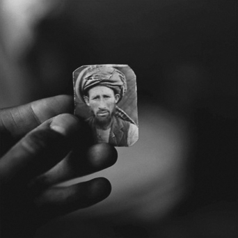 Fazal Sheikh (American, b. 1965) 'The Victor Weeps: Afghanistan (Abdul Aziz holding a photograph of his brother, Mula Abdul Hakim)' 1997