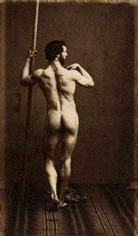 Eugène Durieu (French, 1800-1874) 'Naked man standing, back, holding a vertical stick' Nd
