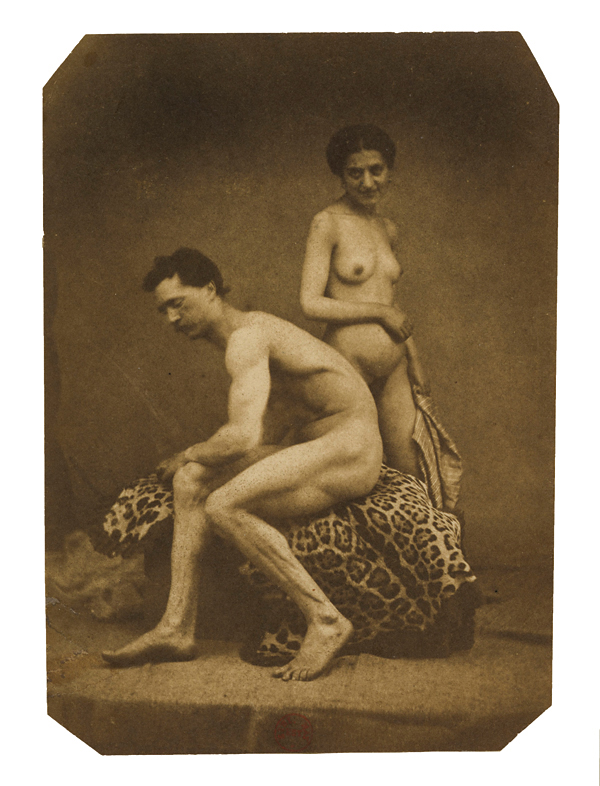 Eugène Durieu (French, 1800-1874) 'Nude couple: female nude standing in the background, male nude sitting in profile on a leopard skin' 1854