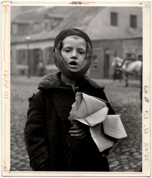 Roman Vishniac (Russian-American, 1897-1990) 'A Boy with a toothache. Next year another child will inherit the tattered schoolbook. Slonim' c. 1935-1938