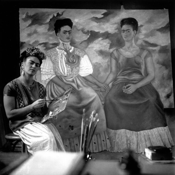 Nickolas Muray (American, 1892-1965) 'Frida Painting the Two Fridas, Coyoacan' 1939