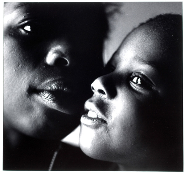Eli Reed (American, b. 1946) 'A Mother and Her Son at Her Home In Bed Sty in Brooklyn' c. 1990
