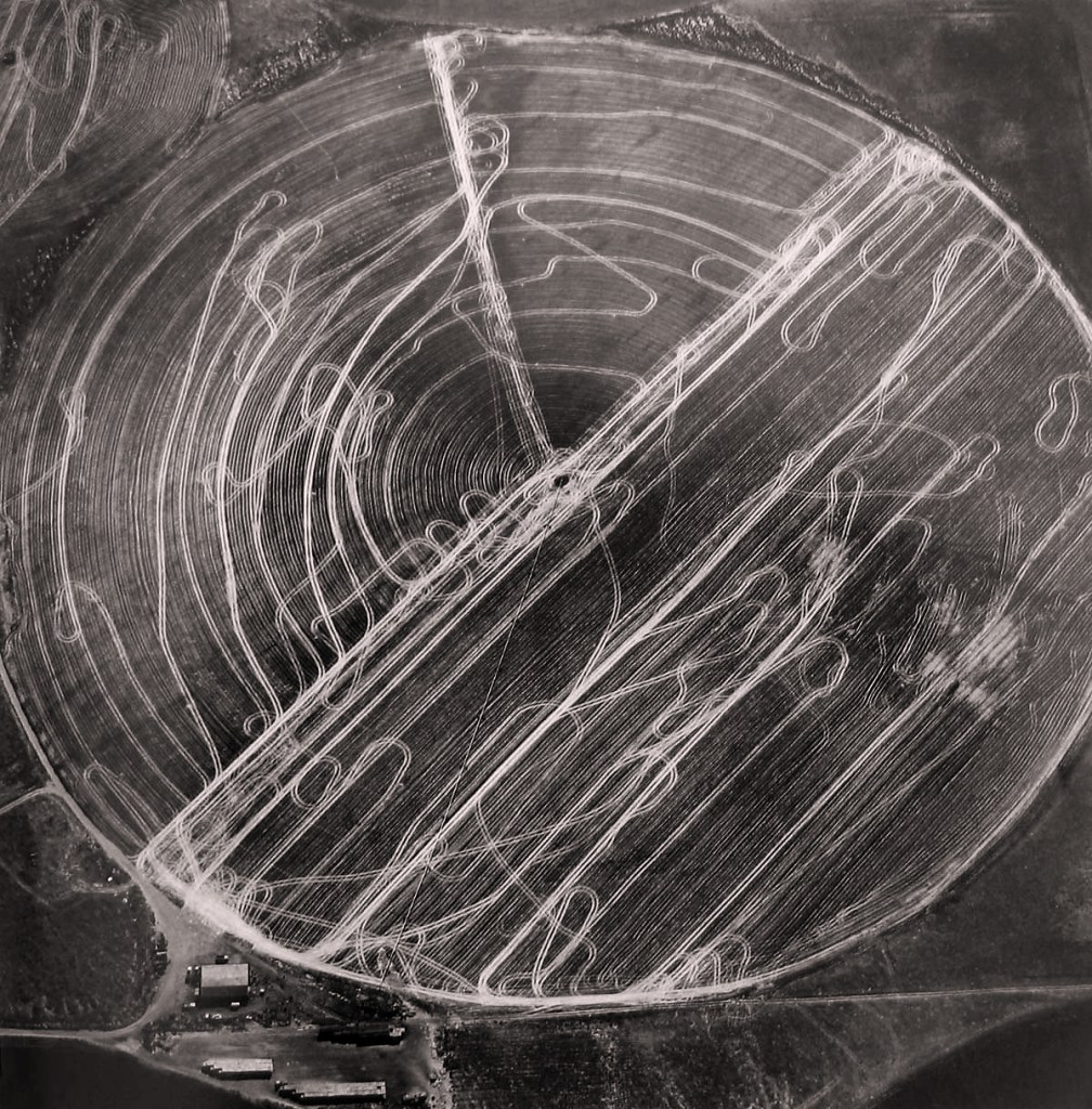 Emmet Gowin (American, b. 1941) 'Harvest traffic over agricultural pivot near Hermiston, Orgeon, 1991' 1991