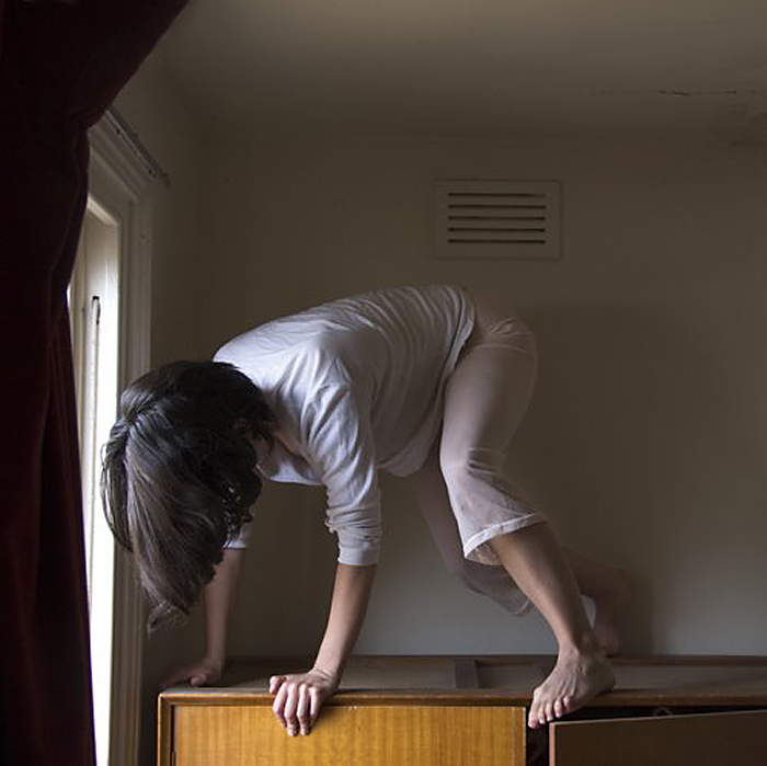 Clare Rae (Australian, b. 1981) 'Untitled' from the series 'Climbing the Walls and Other Actions' 2009 from the exhibition 'Climbing the Walls and Other Actions' by Clare Rae at the Centre for Contemporary Photography, Fitzroy, Melbourne, August - Sept, 2009