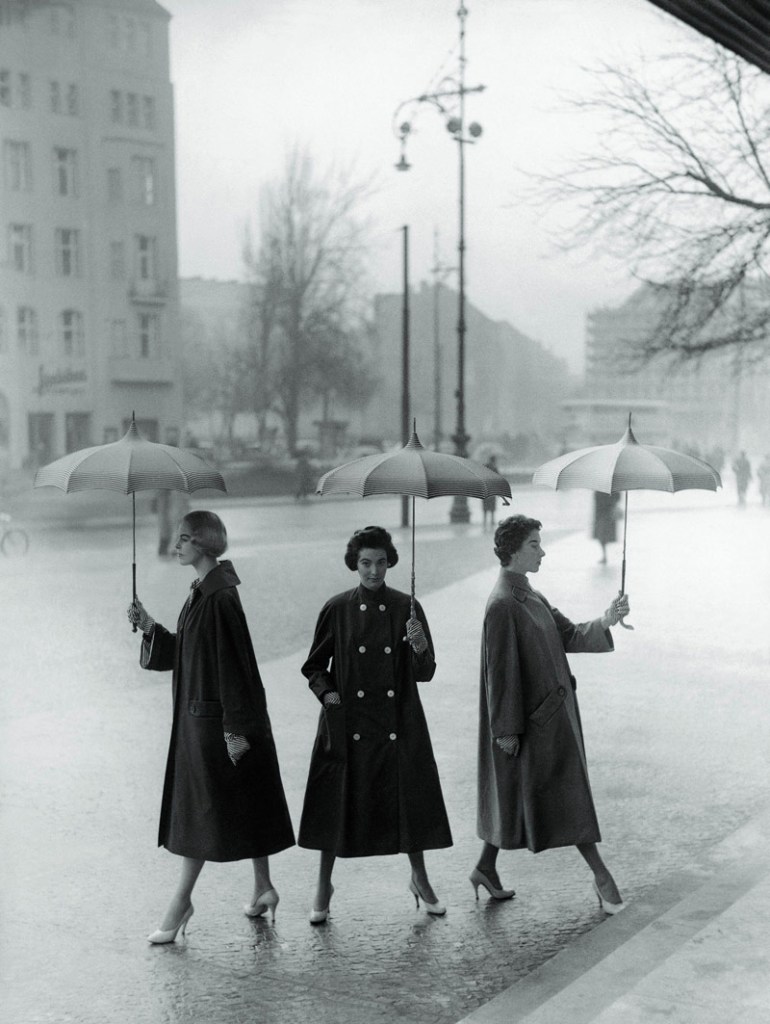 F.C. Gundlach (German, 1926-2021) 'Rainweather, party sunshiny. Three poplin coats by Staebe-Seger' Berlin 1955