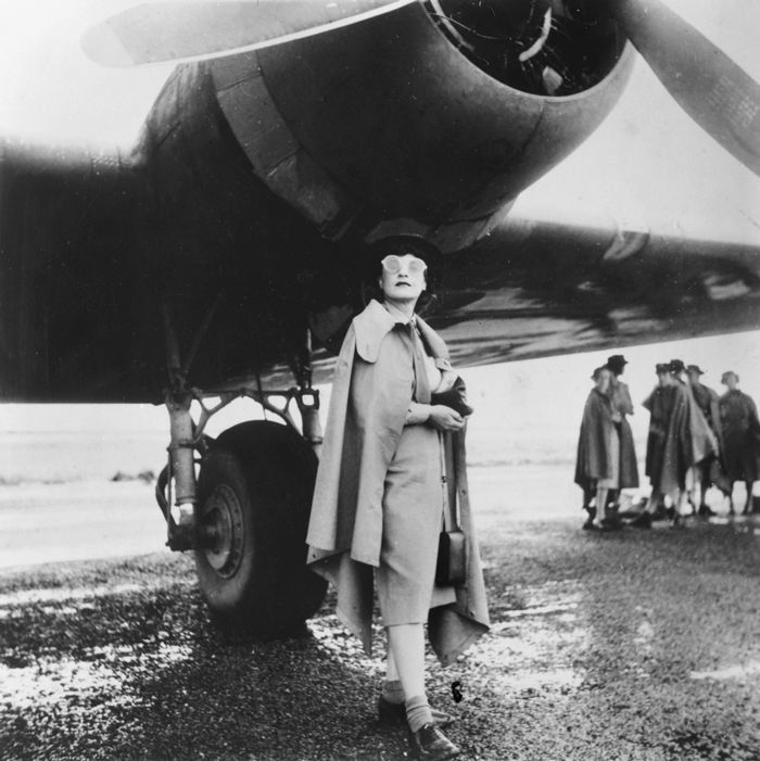 Barbara Joan Isaacson (Australian, 1923-2017) 'Journalist Iris Dexter standing under the starboard engine of a Douglas C-47 aircraft' February - March 1943 from the exhibition 'Icon & archive: photography & the World Wars' at the Monash Gallery of Art, Melbourne, April - July, 2010