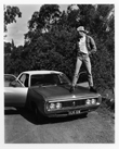 Marcus Bunyan. 'Jeff standing on his Chrysler' 1992