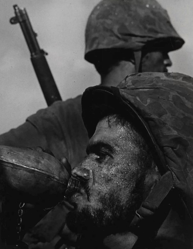 W. Eugene Smith (American, 1918-1978) '[Frontline Soldier with Canteen at Saipan]' June 1944