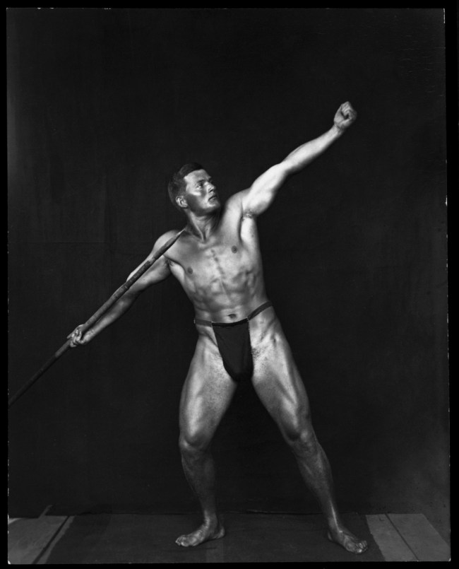 Photographer unknown. 'A young internee strikes a tableau vivant warrior pose' c. 1915 - 1919