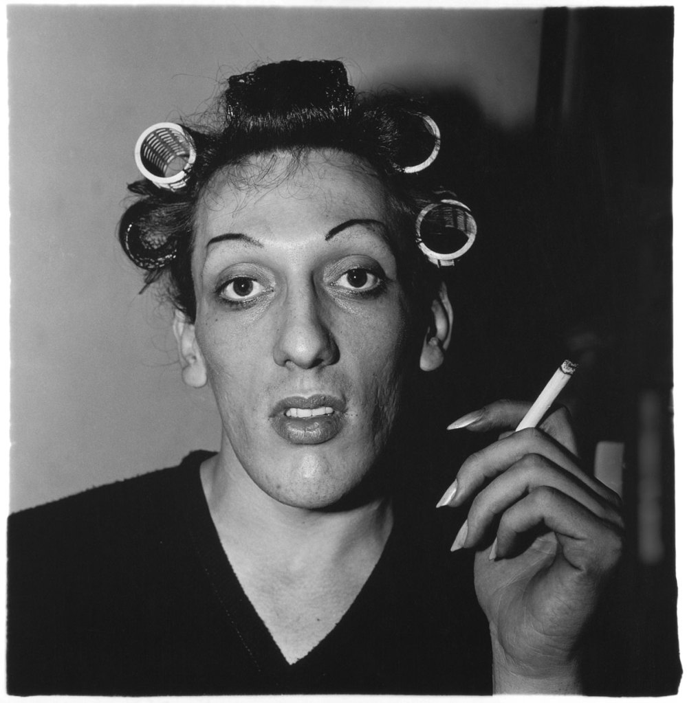 Diane Arbus (American, 1923-1971) 'A young man in curlers at home on West 20th Street, N.Y.C. 1966' 1966