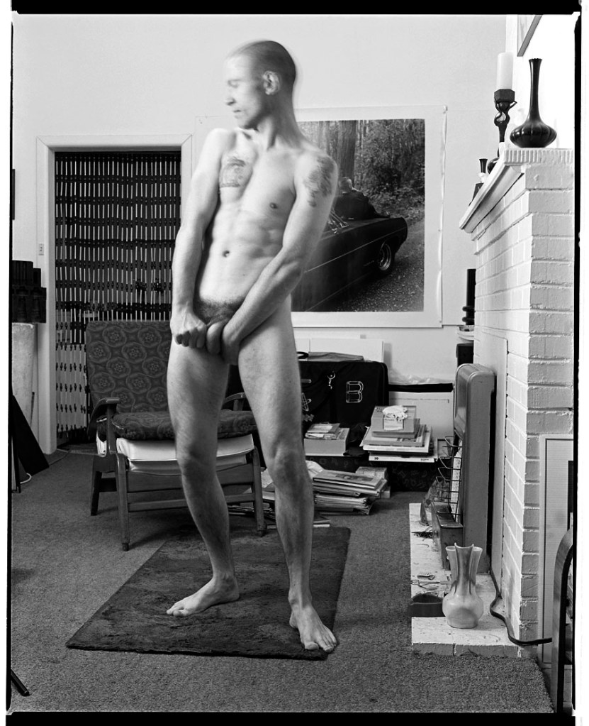 Marcus Bunyan (Australian, b. 1958) 'Self-portrait, nude with the mural 'Two boys on a car'' 1992