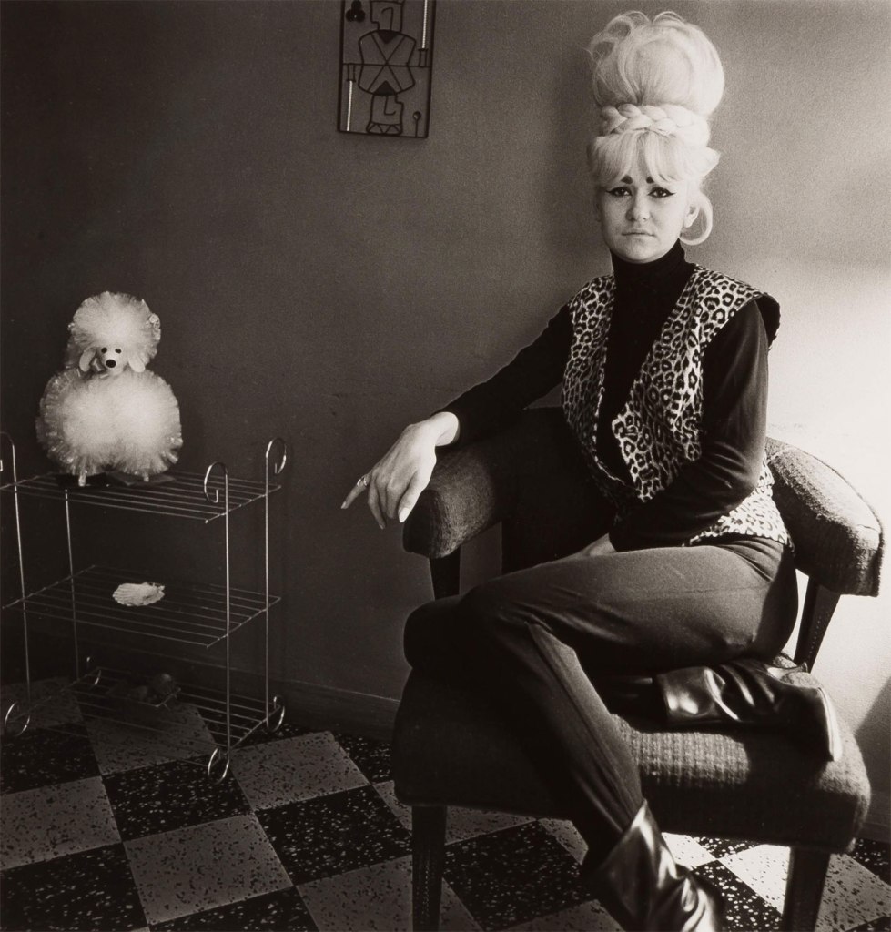 Diane Arbus (American, 1923-1971) 'Lady Bartender at Home with a Souvenir Dog, New Orleans, La.' 1964 from the exhibition 'Diane Arbus' at Jeu de Paume, Paris, Oct 2011 - Feb 2012