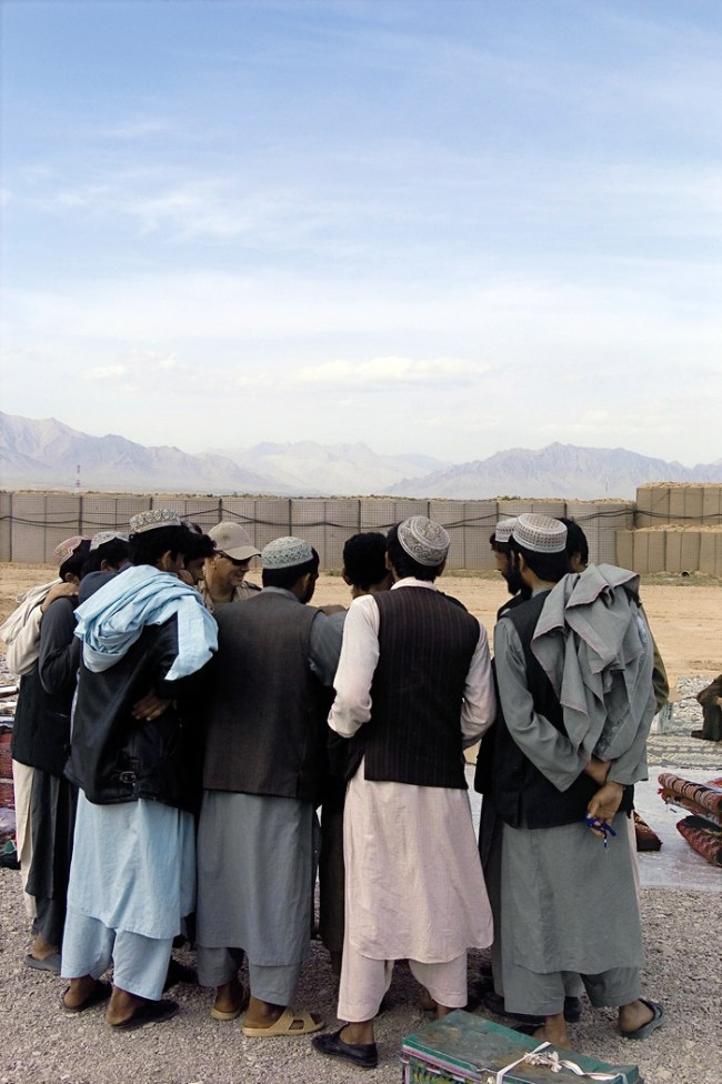 Charles Green (Australian, b. 1953) and Lyndell Brown (Australian, b. 1961) 'Afghan traders with soldiers, market, Taran Kowt Base Uruzgan Province, Afghanistan' 2007 printed 2009