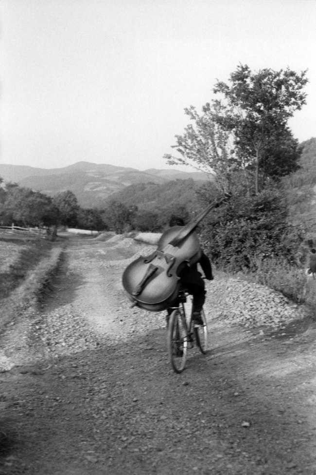 Henri Cartier-Bresson (French, 1908-2004) 'Serbia. Bass player on the road Belgrade-Kraljevo, to play at a village festival near Rudnick' Yugoslavia 1965 Henri Cartier-Bresson (French, 1908-2004) 'Serbia. Bass player on the road Belgrade-Kraljevo, to play at a village festival near Rudnick' Yugoslavia 1965