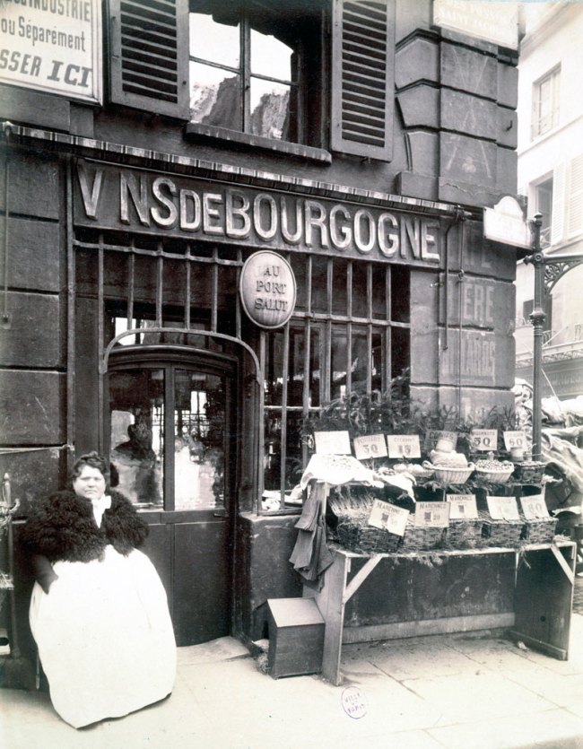 Eugène Atget (French, 1857-1927) 'Cabaret "Au Port Salut," marchande de coquillages, rue des Fossés-Saint-Jacques, 5e arrondissement' 1903