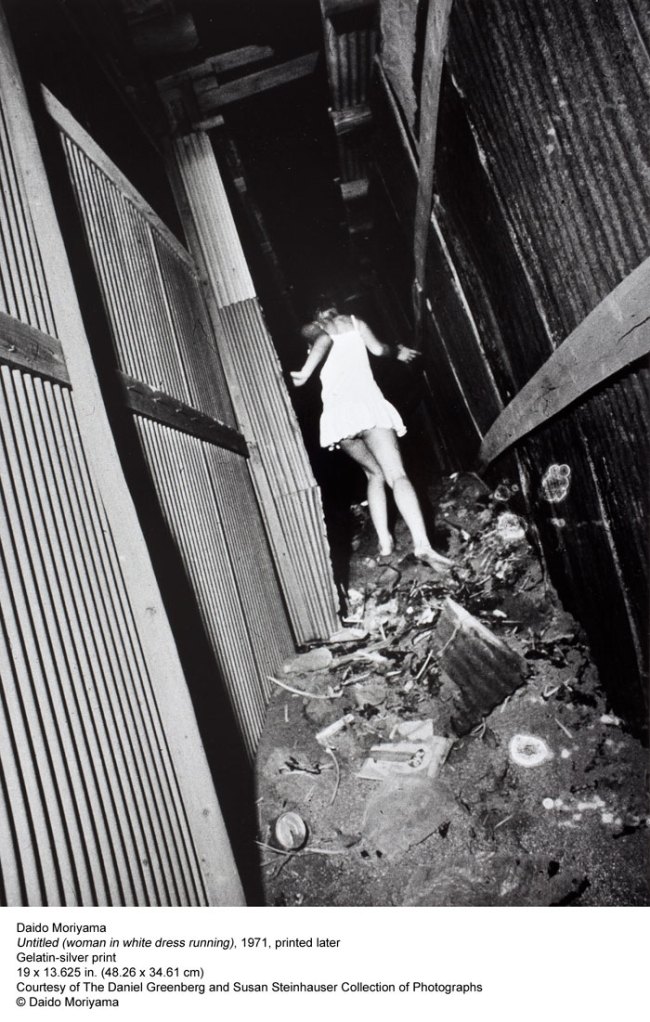 Daido Moriyama (Japanese, b. 1938) 'Untitled (woman in white dress running)' 1971