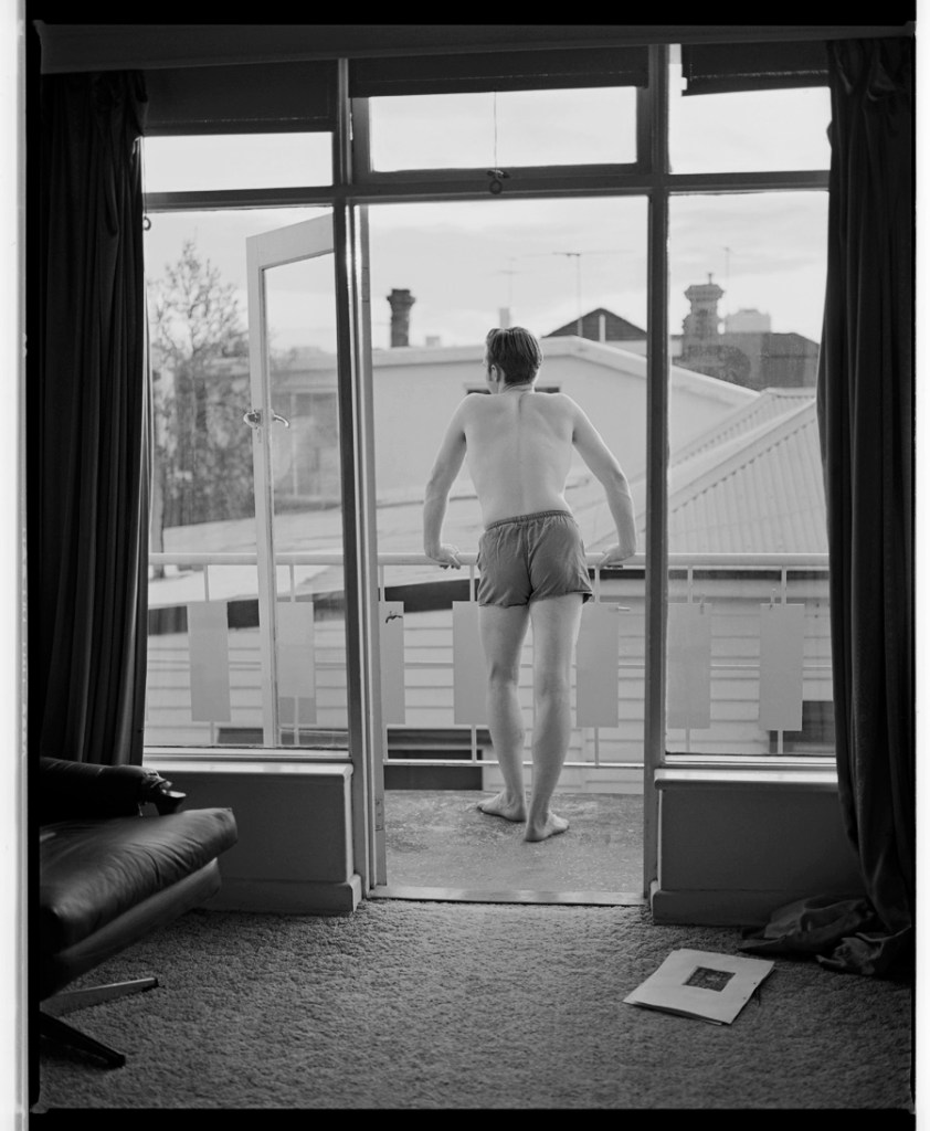 Marcus Bunyan (Australian, b. 1958) 'Paul on the balcony, Mcilwrick Street, Windsor' 1992-1994 from the Marcus Bunyan black and white archive: 'Circumnavigation', 1992-1994