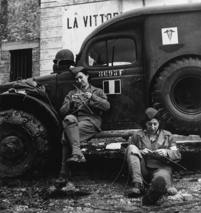 Robert Capa (1913-1954) 'Drivers from the French ambulance corps near the front, waiting to be called' Italy, 1944