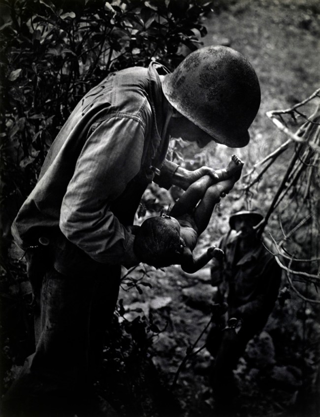 W. Eugene Smith (American, 1918-1978) 'Dying Infant Found by American Soldiers in Saipan' June 1944 W. Eugene Smith (American, 1918-1978) 'Dying Infant Found by American Soldiers in Saipan' June 1944