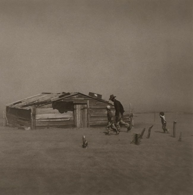 Arthur Rothstein (American, 1915-1985) 'Father and Sons Walking in the Face of a Dust Storm, Cimarron County, Oklahoma' 1936