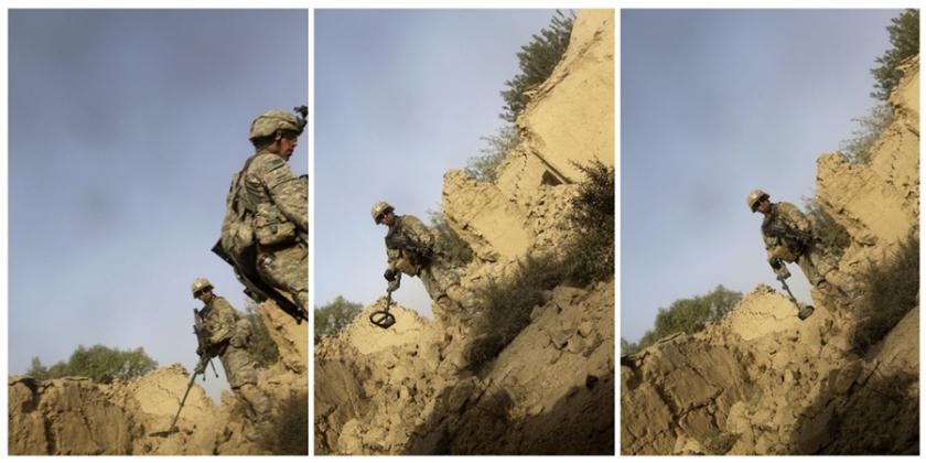 João Silva. 'Soldiers of Charlie Company, 1st Battalion, 66th Armored Regiment, 4th Infantry Division react to photographer Joao Silva stepping on a mine in the Arghandab district of Kandahar Province, Afghanistan, on Oct. 23, 2010'