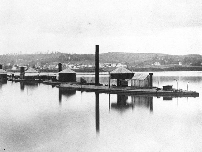 Kilburn Brothers (Edward and Benjamin Kilburn, American) 'Four monitors laid up in the Anacostia River, off the Washington Navy Yard' c. 1866