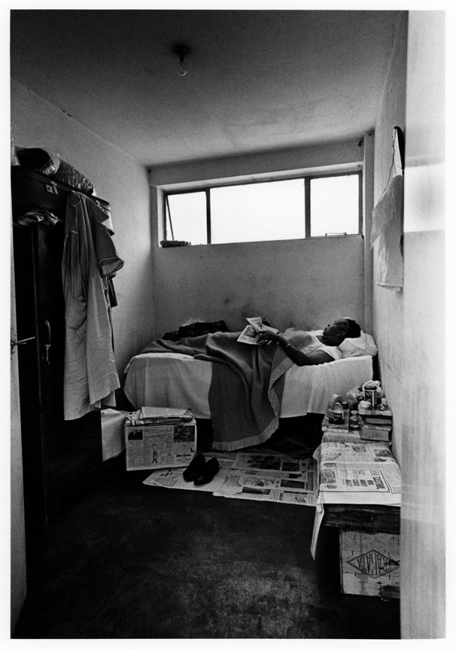 Ernest Cole (South African, 1940-1990) 'Newspapers are her carpet, fruit crates her chairs and table' 1960-1966