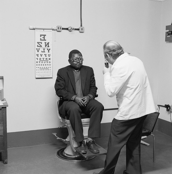 David Goldblatt (South African, 1930-2018) 'Eyesight testing at the Vosloorus Eye Clinic of the Boksburg Lions Club' 1980