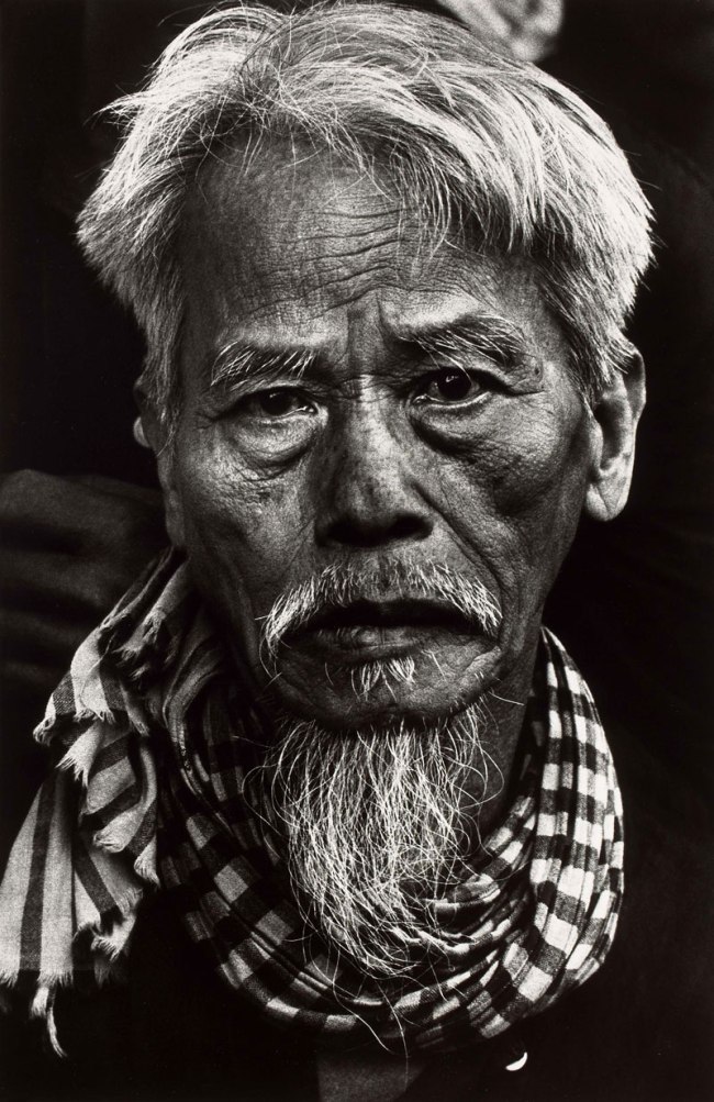 Don McCullin (British, b. 1935) 'Old Vietnamese man, Tet Offensive, Hué, South Vietnam' February 1968