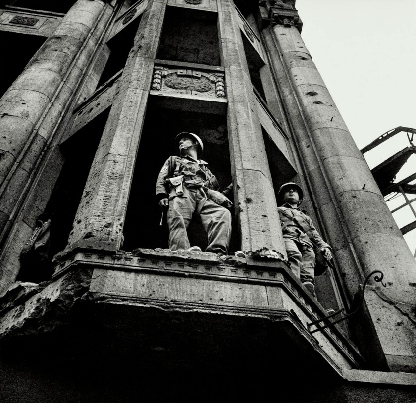 Don McCullin (British, b. 1935) 'American Troops Looking across the Wall, Berlin' 1961