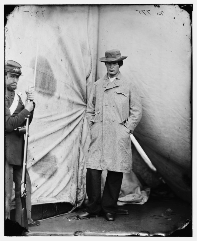 Alexander Gardner (American born United Kingdom, 1821-1882) '[Washington Navy Yard, D.C. Lewis Payne, the conspirator who attacked Secretary Seward, standing in overcoat and hat]' April 1865