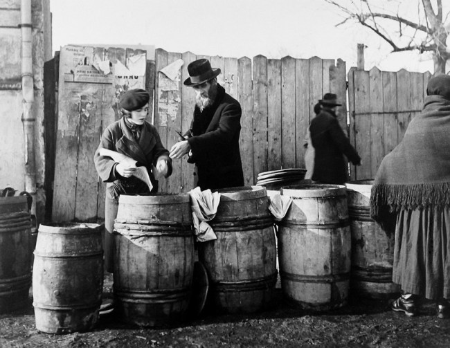 Roman Vishniac (Russian-American, 1897-1990) 'Herring for the traditional third meal of Shabbath, Mukachevo' 1937-1938