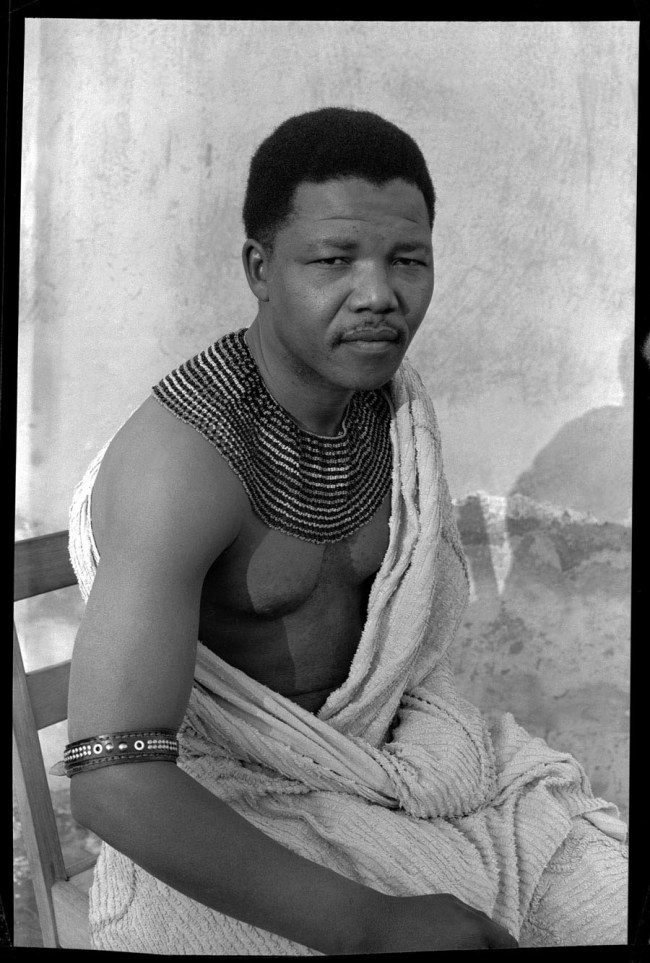 Eli Weinberg (South African born Latvia, 1908-1981) 'Nelson Mandela portrait wearing traditional beads and a bed spread. Hiding out from the police during his period as the "black pimpernel," 1961' 1961