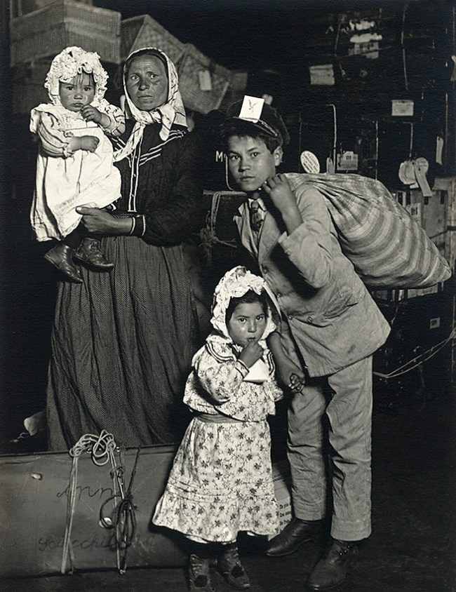 Lewis W. Hine (American, 1874–1940) 'Italian Family Looking for Lost Baggage, Ellis Island, New York' 1905 