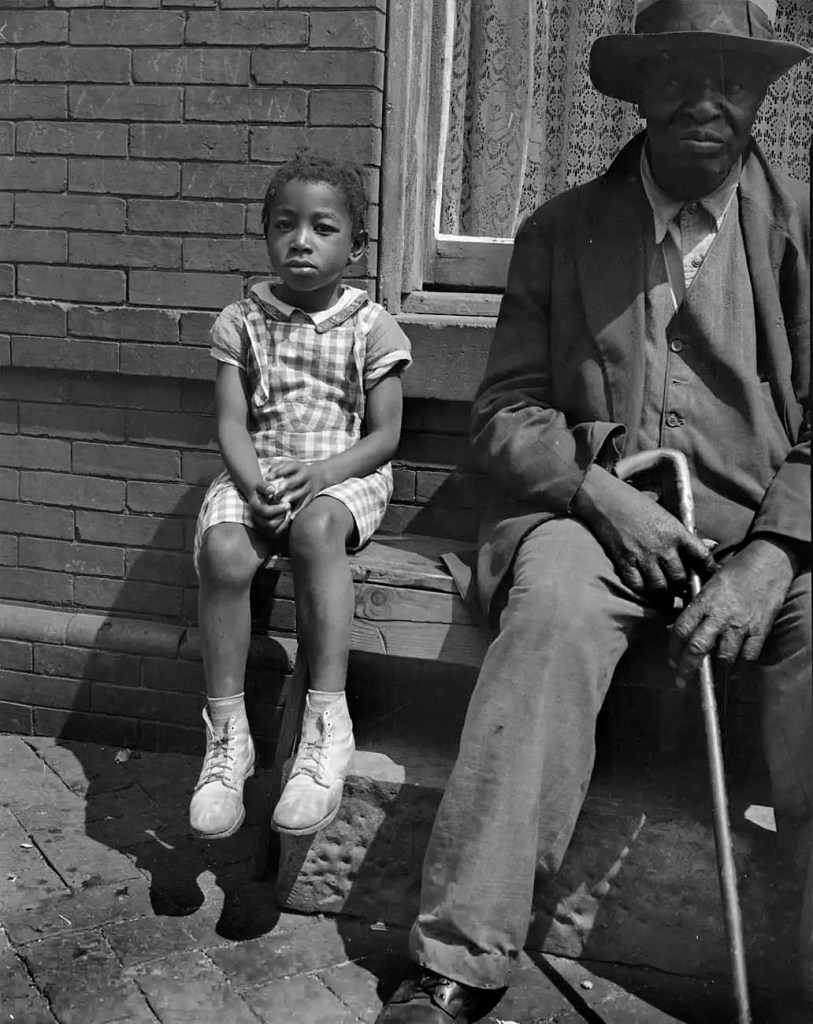 Gordon Parks (American, 1912-2006) 'Grandfather and grandchild on Seaton Road, Washington, DC, 1942' 1942