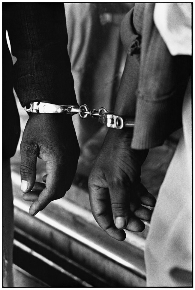 Ernest Cole (South African, 1940-1990) 'Handcuffed blacks were arrested for being in white area illegally' 1960-1966