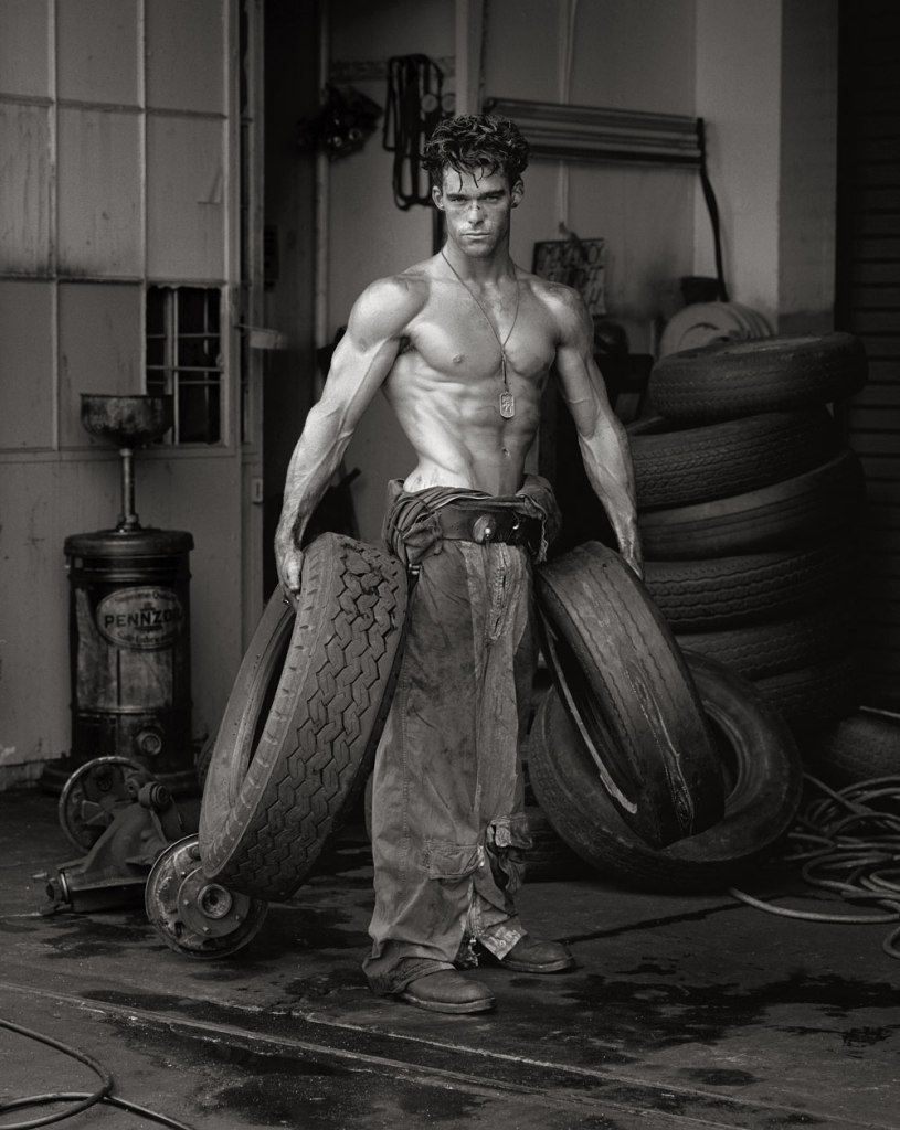 Herb Ritts (American, 1952-2002) 'Fred with Tires - Bodyshop Series, Hollywood' 1984 from the exhibition 'Herb Ritts: Beauty and Celebrity' at Oklahoma City Museum of Art, Oklahoma City, May - July, 2013