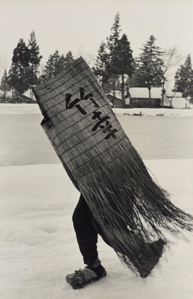 Hiroshi Hamaya (Japanese, 1915-1999) 'Man in a Traditional Minobashi Raincoat, Niigata Prefecture' 1956