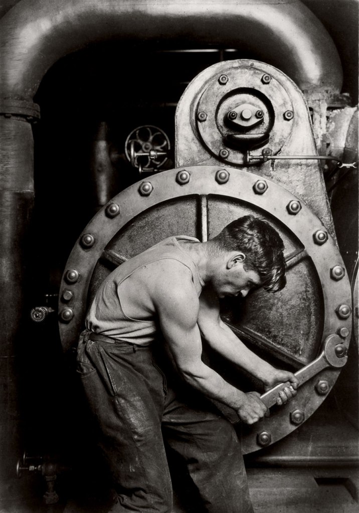 Lewis Hine (American, 1874-1940) 'Mechanic at steam pump in electric power house' 1920