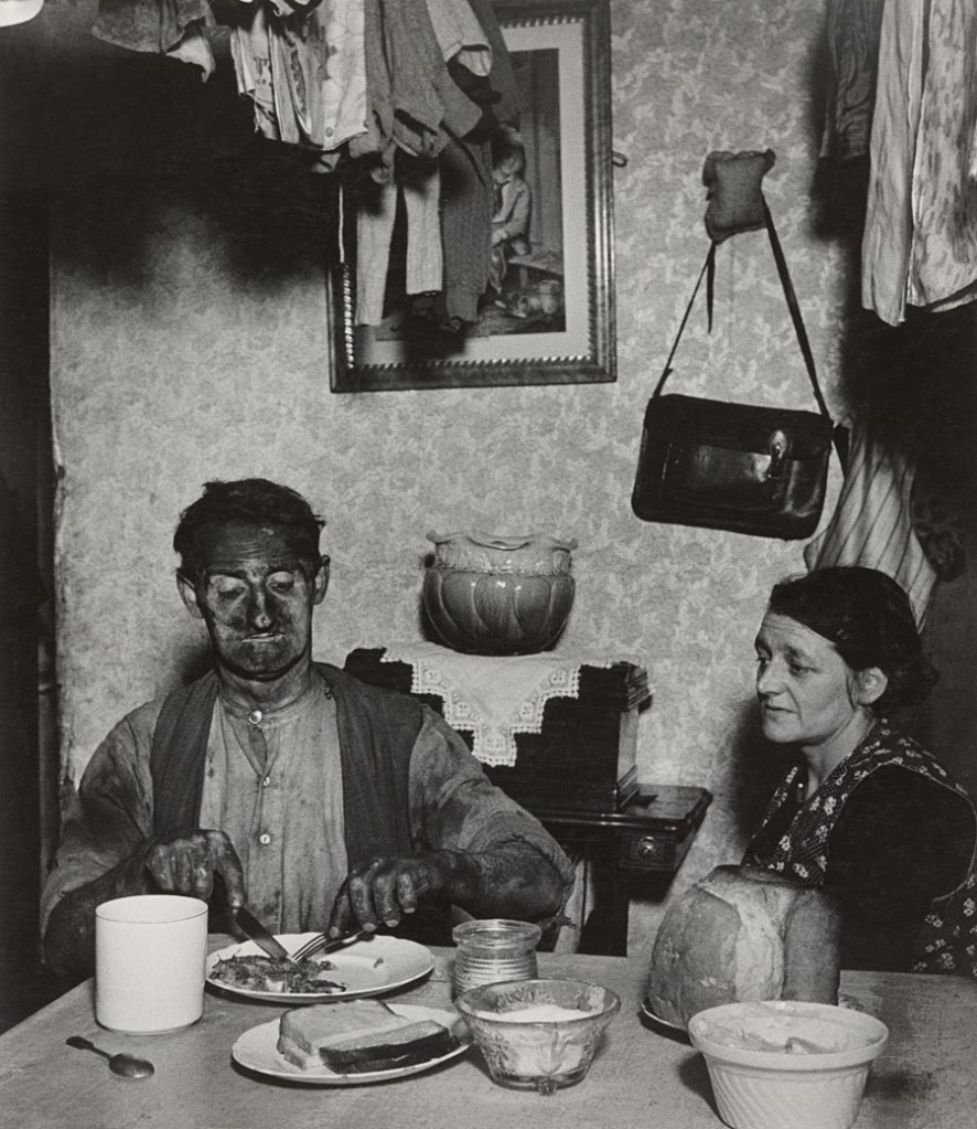 Bill Brandt (British born Germany, 1904-1983) 'Northumbrian Miner at His Evening Meal' 1937