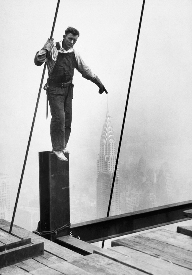 Lewis Hine (American, 1874-1940) '[Steelworker touching the tip of the Chrysler Building]' c. 1931