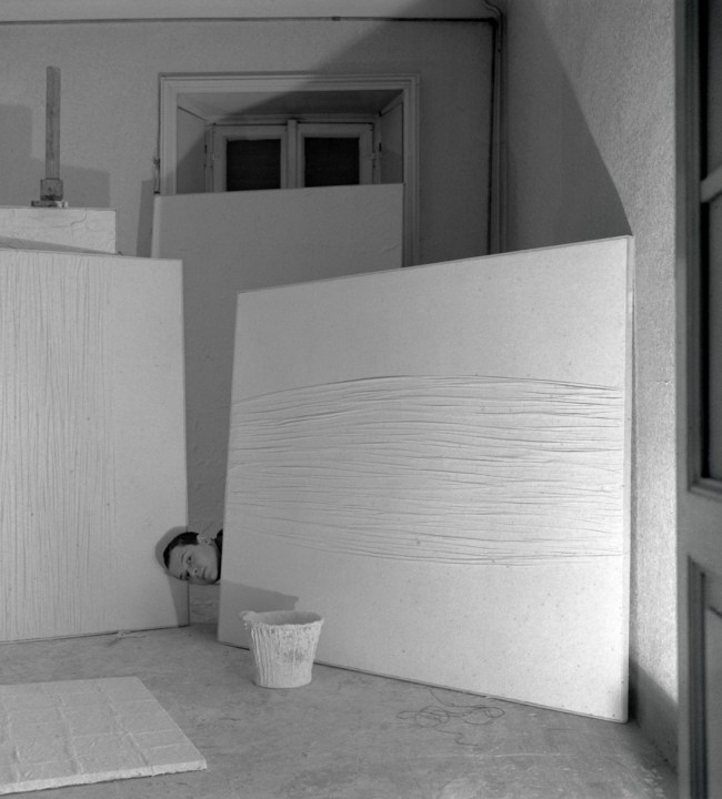 Ennio Vicario (Italian, b. 1935) 'Manzoni in his studio in Via Fiori Oscuri' 1958