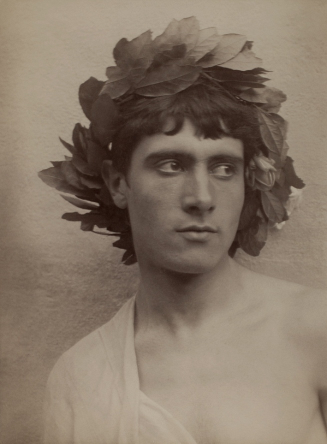 Baron Wilhelm von Gloeden (German, 1856-1931) 'Youth with wreath on head' c. 1900