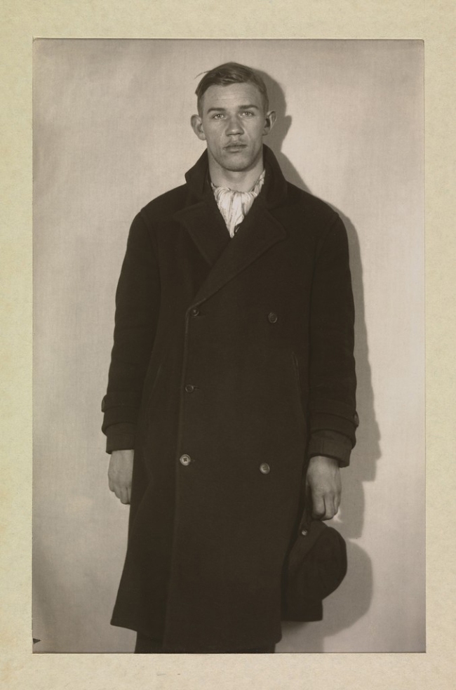 August Sander (German, 1876-1964) '[Unemployed Man in Winter Coat, Hat in Hand]' 1920