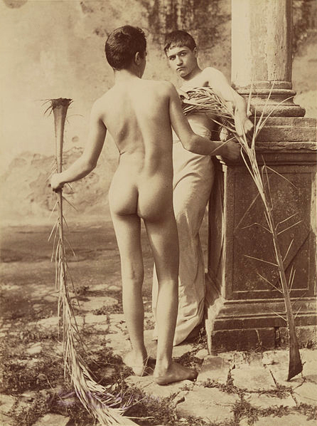 Wilhelm von Gloeden (German, 1856-1931) 'Two Male Youths Holding Palm Fronds' c. 1885-1905