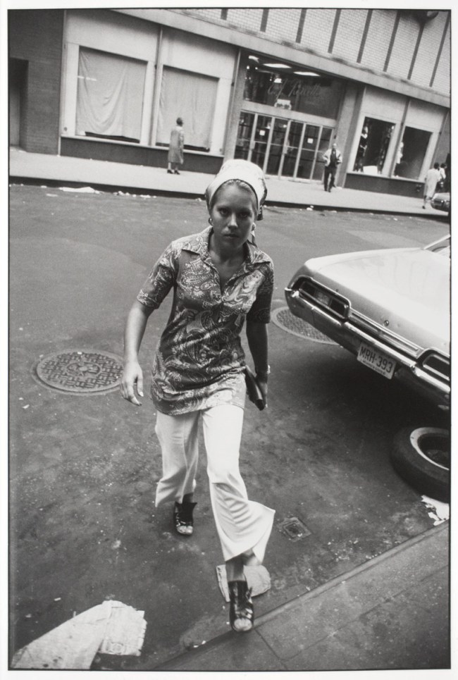 Garry Winogrand (American, 1928-1984) 'Untitled (Woman Crossing Street, New York)' about 1970