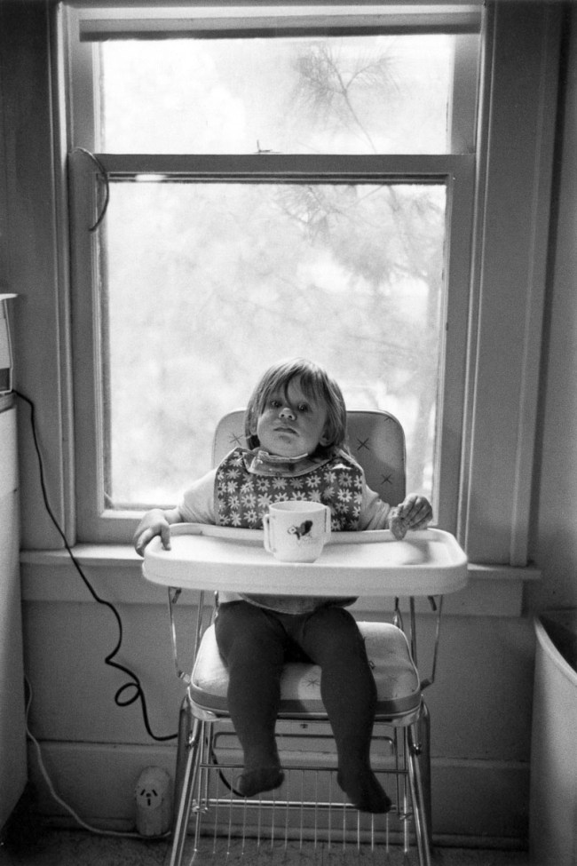 Enrico Natali (American, b. 1933) 'Ana Kuzick at home in high chair, Detroit, 1968' 1968