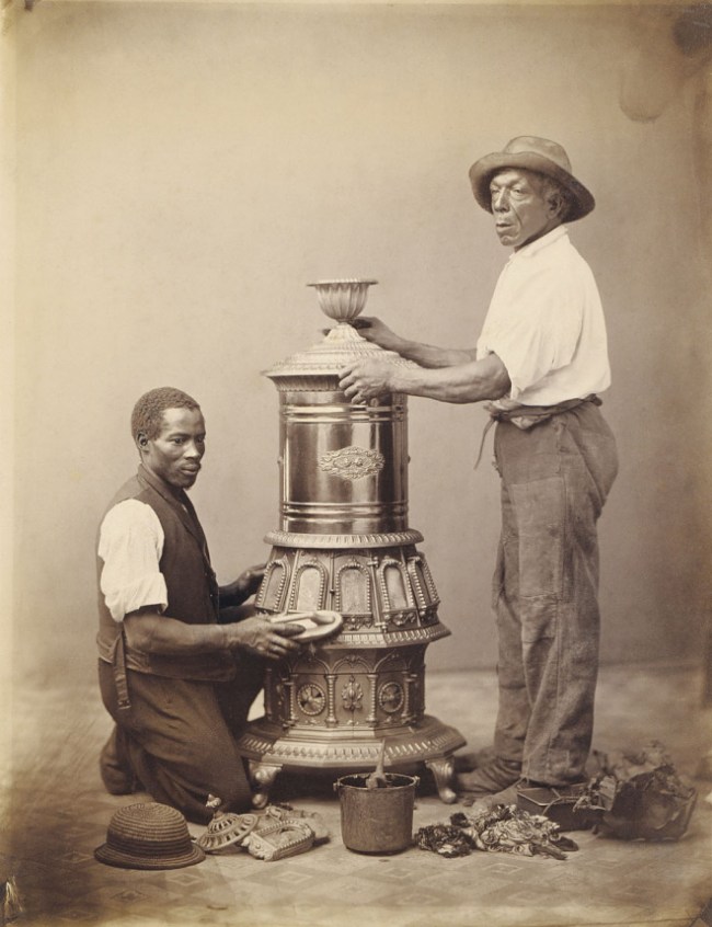 Unidentified artist. '[Two Workmen Polishing a Stove]' c. 1865