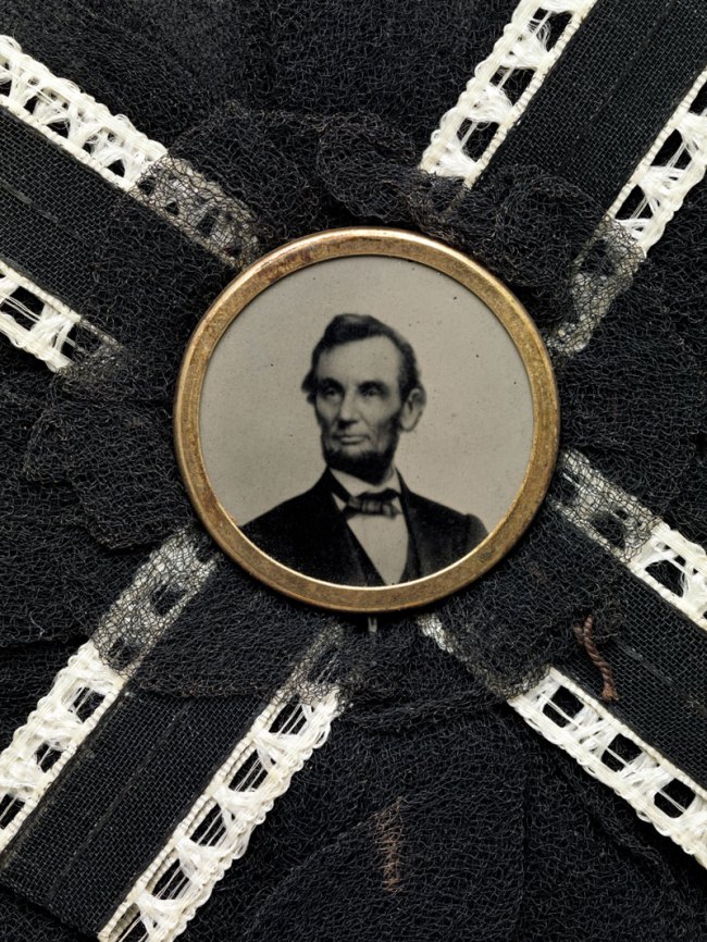 Unknown maker (American); Photography Studio: After, Brady & Co., American, active 1840s–1880s '[Mourning Corsage with Portrait of Abraham Lincoln]' Photograph, corsage April 1865 (detail)