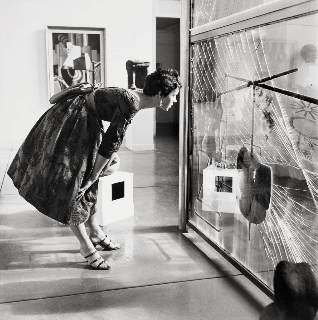 Hermann Landshoff (American-German, 1905-1986) 'Model in front of "The Large Glass" by Marcel Duchamp, Philadelphia Museum of Art' 1954